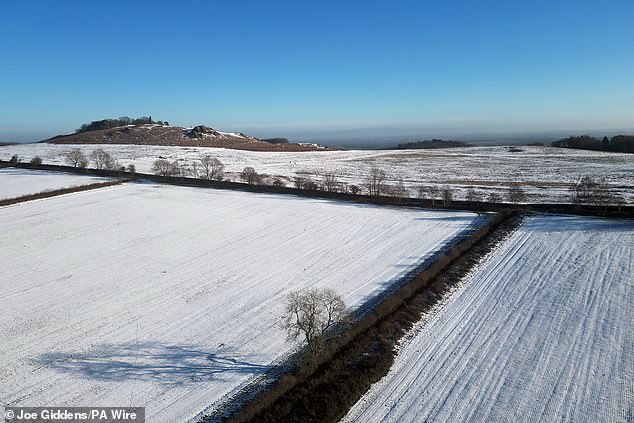 Clear blue skies above snow covered fields in Newtown Linford, Leicestershire