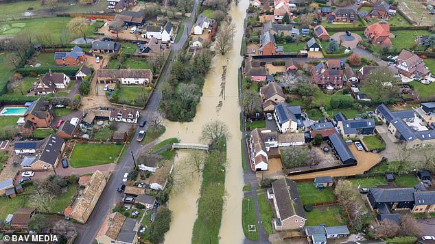 Flooding on the high street in the Cambridgeshire village of Alconbury Weston on Friday afternoon