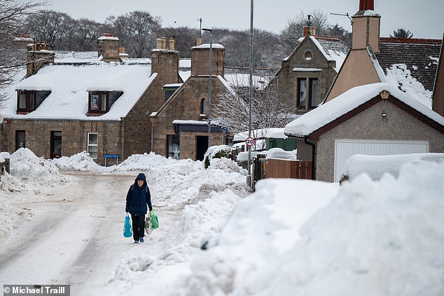 Heavy snow and freezing conditions continue to people in Insch, Aberdeenshire, on Friday