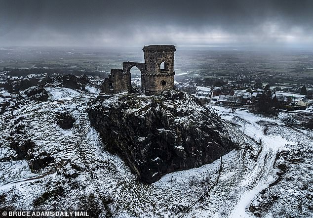 Snowfall at Mow Cop Castle on the border of Cheshire and Staffordshire on Friday morning