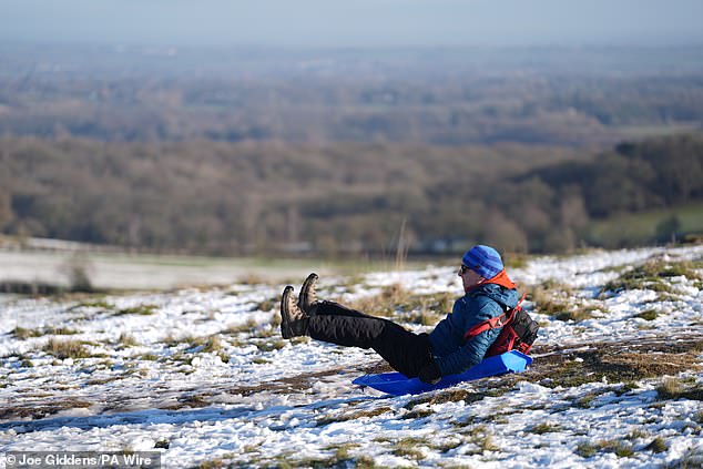 A person sledges in Bradgate Park, Leicestershire, as Storm Goretti hits the UK