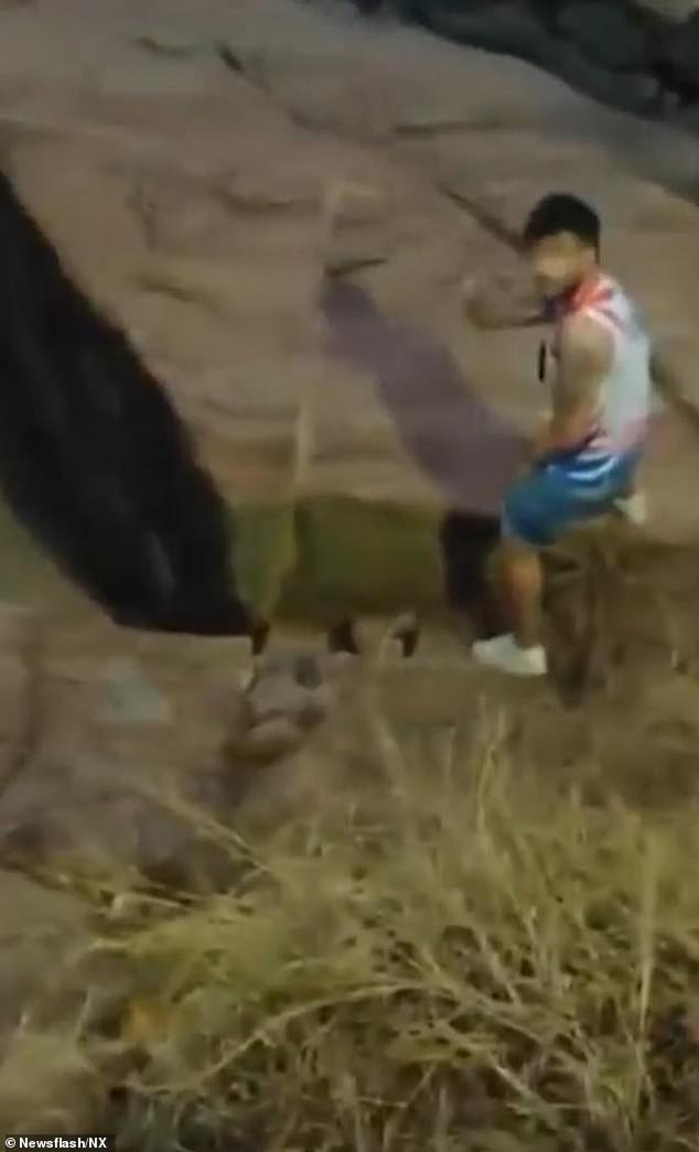 Video shows Luiz Guilherme Campitelli descending the rocks, undated. He died in Sao Conrado, Rio de Janeiro, on Sept.ember 14,2025