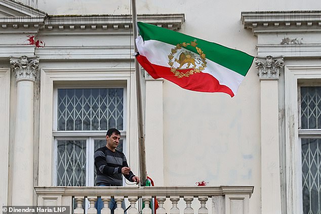 He was filmed replacing it with the lion and sun flag instead, which was used by Iran prior to the Islamic revolution in 1979