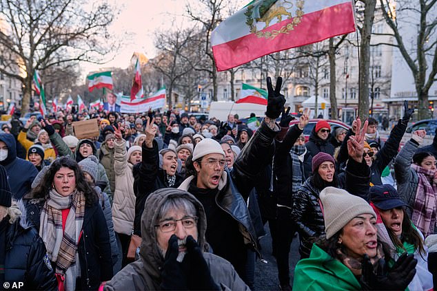 Hundreds of people join a march through central Berlin in support of protesting Iranians in Berlin on Saturday