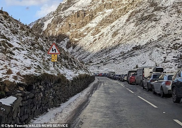 Police have hit out at Instagram-loving tourists for their 'ridiculous' parking on Snowdon while it has been covered with snow