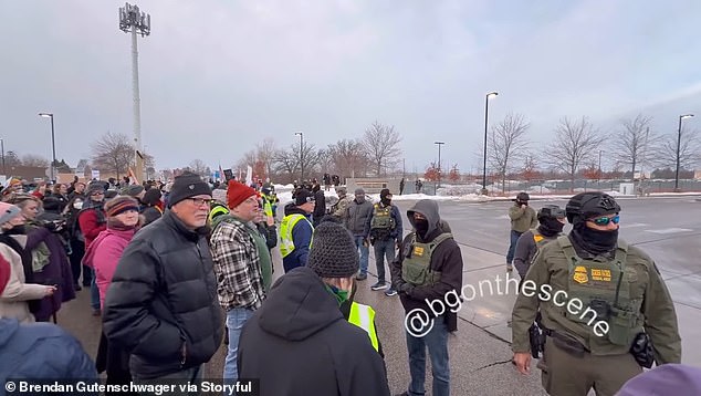 Other protesters were seen holding signs that said 'f**k ICE' as they faced off with federal agents