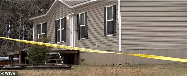 Pictured: The home where the seven-year-old was found shot in the head