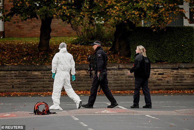 Police and forensics at the scene of the Manchester synagogue attack. The Jewish community has faced a string of attacks at home and overseas on Jewish holy days
