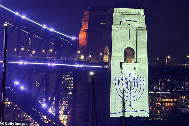 An image of a menorah projected onto Sydney Harbour Bridge during New Year's Eve celebrations last year. Last month, 15 people were shot dead and dozens injured during the Bondi Beach terror attack in Sydney on Jewish people celebrating the festival of Hanukkah