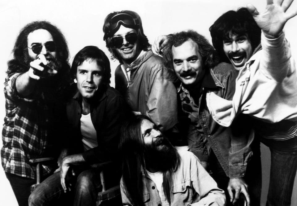 The Grateful Dead: Jerry Garcia, Bob Weir, Phill Lesh, Brent Myland, Bill Kreutzmann, Mickey Hart, ca.early 1980's. Courtesy CS