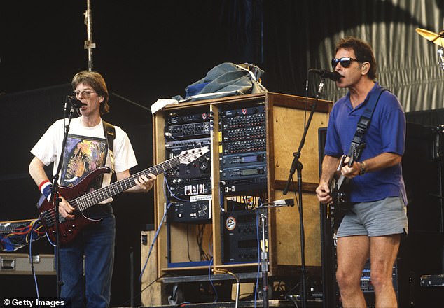 His musical journey began at just 16, when he wandered into a Palo Alto music store following the sound of a banjo and met Jerry Garcia, who was strumming inside; (Phil Lesh (L) and Bob Weir in 1993)