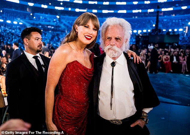 Taylor Swift posed with Weir at the 67th Grammy Awards in 2025