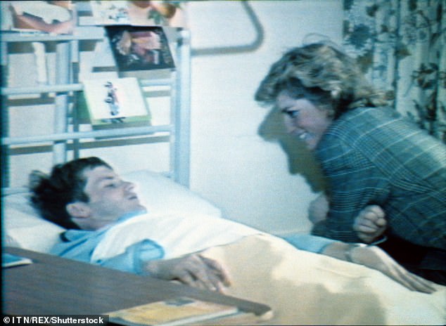 Princess Diana in hospital talking to a victim of the bombing