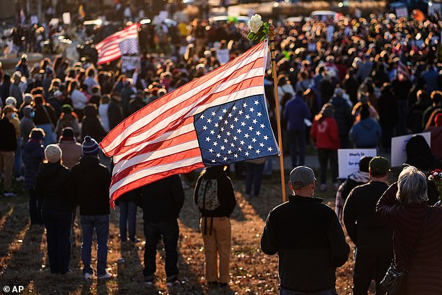 Protesters gather during a rally for Renee Good, who was fatally shot by an ICE officer in Minneapolis