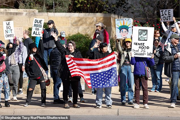 Some protestors could be seen waving an upside-down American flag - a traditional signal of distress