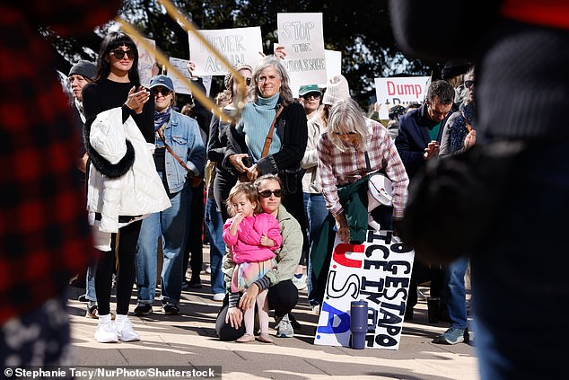 Hundreds protest against ICE outside of Austin City Hall in Austin, Texas, on Saturday