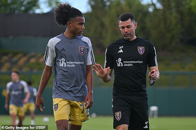 Anthony (right) has gone on to become a coach in the United States after retiring