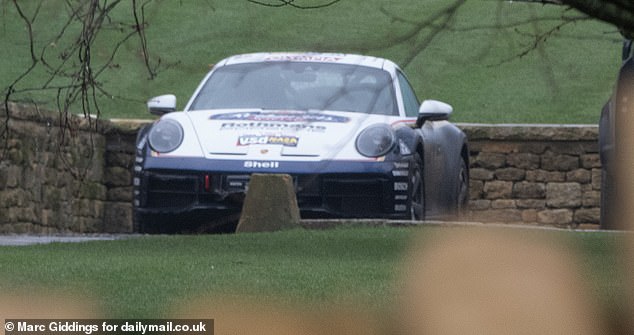The businessman has a huge collection of sports cars which locals claim he 'races through the village'