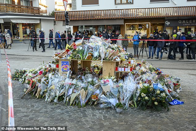 Flowers in Crans-Montana left in tribute to the 40 people who died in the nightclub fire