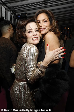 Meanwhile, Crawford rubbed elbows with celebs like Parker Posey, who's nominated for a Globe for her performance in season three of HBO's The White Lotus