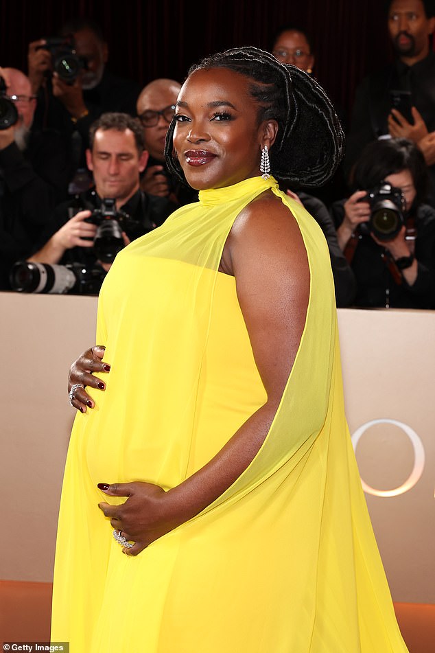 The Sinners actress, 39, looked incredible in a sweeping yellow gown that highlighted her growing bump as she posed on the star-studded red carpet at The Beverly Hilton
