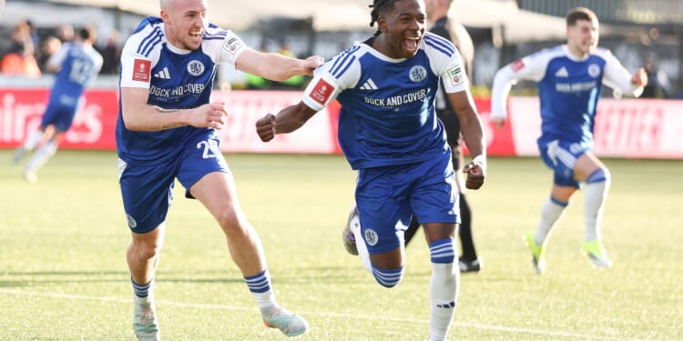 Macclesfield's giant-killing hero Isaac Buckley-Ricketts was almost dumped by club days before downing Crystal Palace