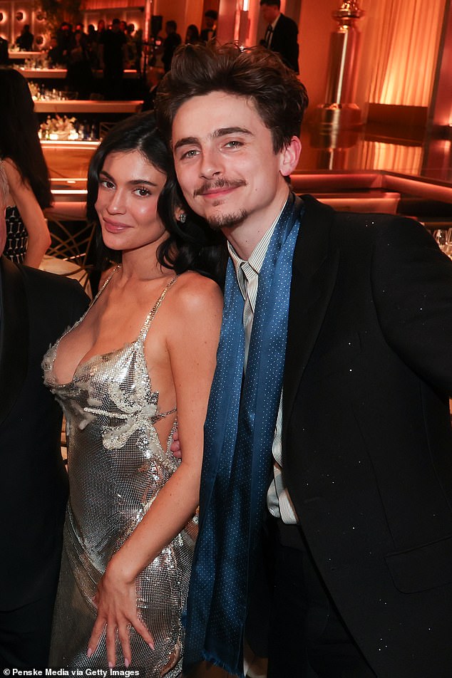 A source later told the Daily Mail that it was 'not a snub' and that Moore 'respects Timothée and admires his talent'; Jenner and Chalamet at the 2025 ceremony