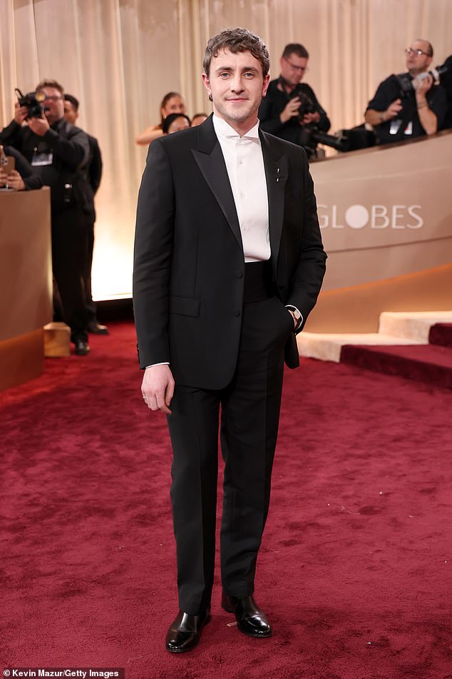Paul Mescal, 29, cut a dapper figure in a classic black suit