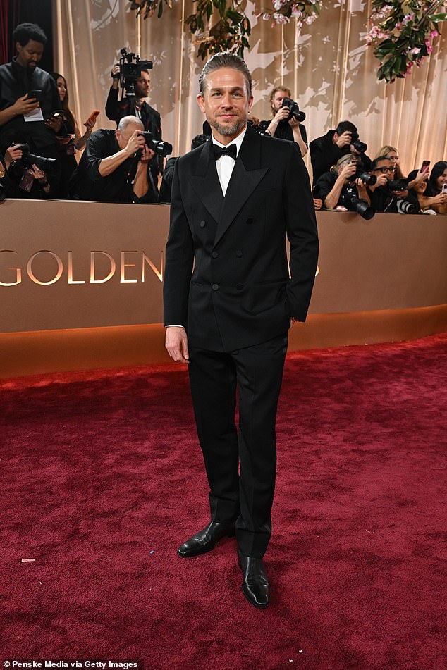 Charlie Hunnam, 45, looked handsome in a black suit