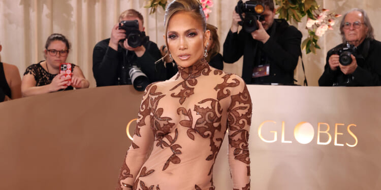 J-Lo and Jennifer Lawrence lead Golden Globes glam as nude illusions and sultry looks stun on the red carpet