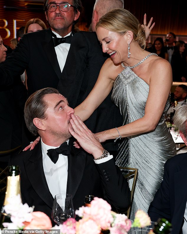 DiCaprio looked very excited to see the Song Sung Blue star