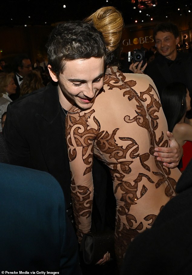 Elsewhere during the evening, Chalamet was seen crossing paths with Jennifer Lopez and the two stars shared an awkward hug in the crowded room