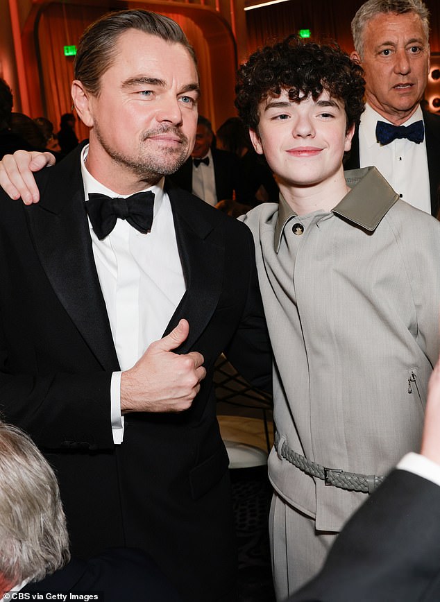 The teenager also was spotted pausing for a picture with DiCaprio - with the Oscar winner flashing a thumbs up towards Cooper