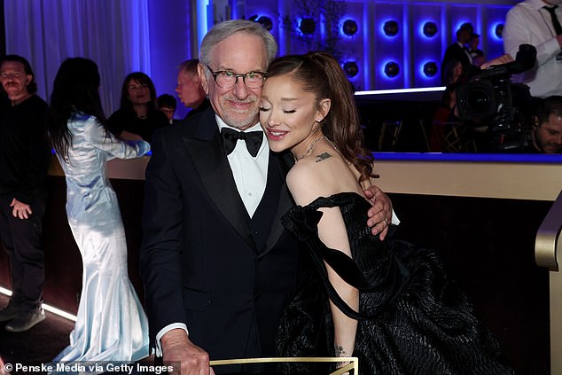 The former Nickelodeon star later mingled with acclaimed filmmaker Steven Spielberg - and the stars paused for a friendly hug