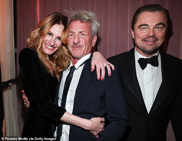 Julia Roberts was spotted embracing Sean Penn - and the pair had a mini reunion after starring together in the 2022 limited series Gaslit. DiCaprio could also be seen smiling in the snap