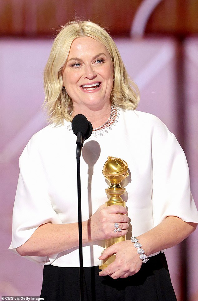 Amy Poehler claimed one of the night's most deliciously awkward wins after taking home the first-ever Golden Globe for Best Podcast