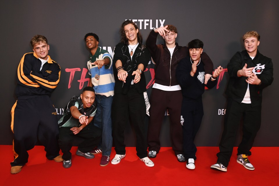 Seven young men from the band December 10 posing for a photo.