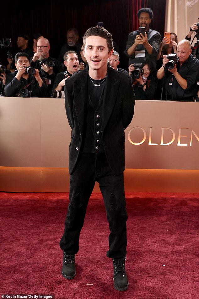 The couple did not walk the red carpet together, with Chalamet opting to brave the event's photographers alone in an all-black outfit