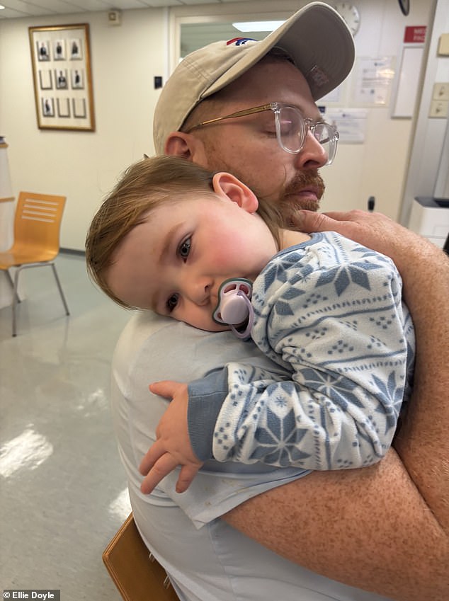 Michael comforting Norah who Ellie said was vaccinated for flu but still caught a nasty bug