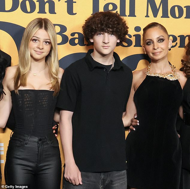 Kate - pictured far L - is the daughter of Nicole and rocker Joel Madden; pictured with her brother Sparrow and mom in 2024