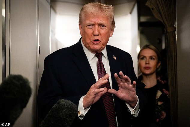 President Donald Trump speaks to reporters Sunday night on board Air Force One. Trump has wanted the Department of Justice to pursue a number of political investigations