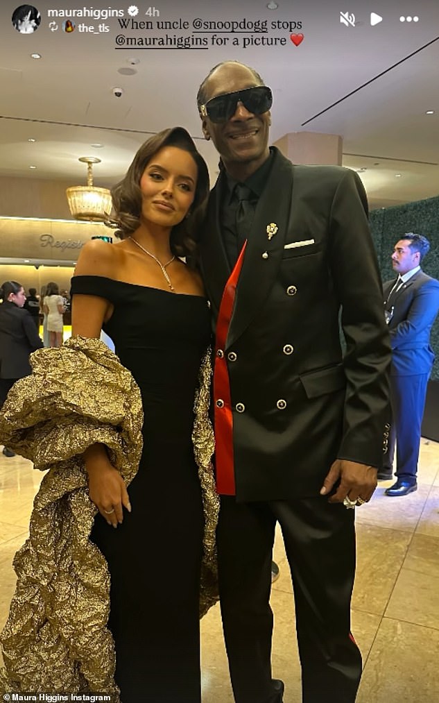 Despite being surrounded by Hollywood stars, The Traitors US star Maura still found herself stopped for a photograph by one of the attendees - none other than Snoop Dogg
