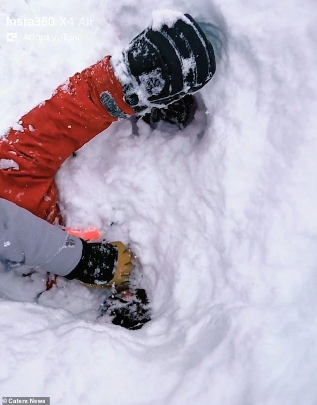 Realising the man was completely buried, Matteo rushed over and began frantically digging him out, using his avalanche training to clear the snow as quickly as possible