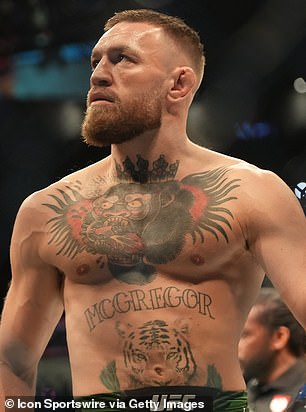 Conor McGregor pictured at a UFC fight against Dustin Poirier in 2021, Las Vegas, has an estimated fortune of £235million