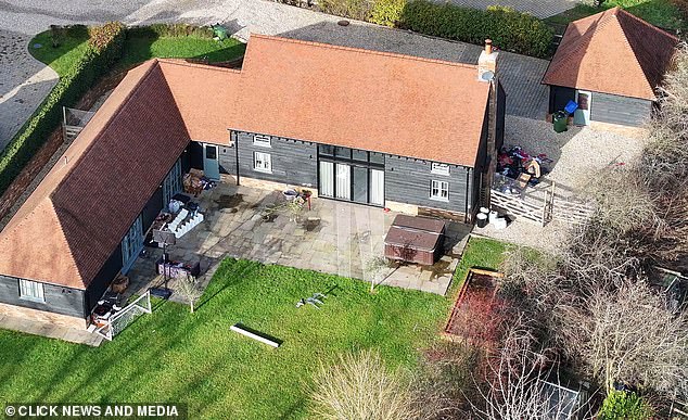 The garden is strewn with rubbish