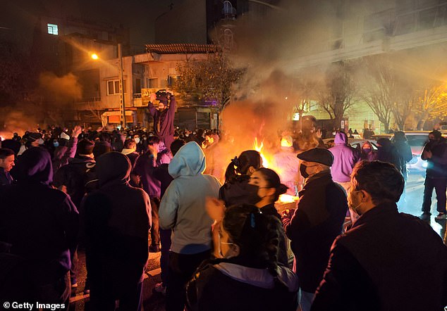 Fires are lit as protesters rally on January 8, 2026 in Tehran, Iran