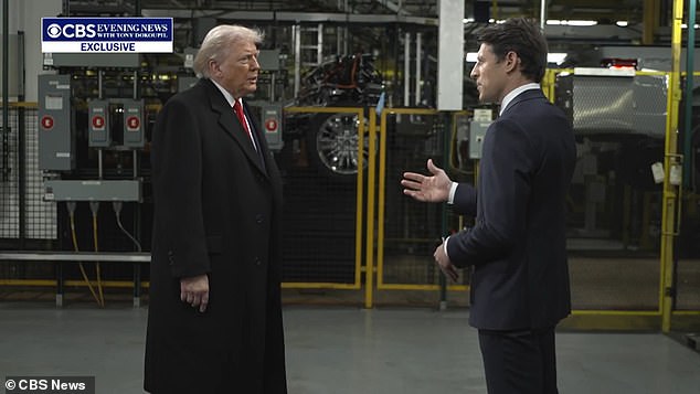 Trump and CBS News' Tony Dokoupil at a Ford plant in Detroit