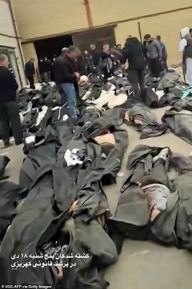 The courtyard of the Forensic Diagnostic and Laboratory Centre of Tehran Province in Kahrizak on January 12, with dozens of bodies in bodybags laid out for family members