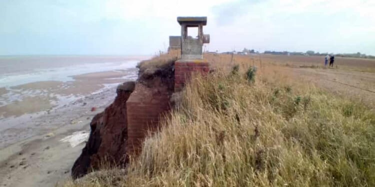 Nuclear bunker teeters on edge of  CLIFF and is 'just a few days' from falling into sea