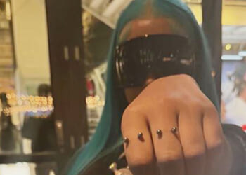 North West, 12, gives shocking close-up look at finger piercings and teases new music